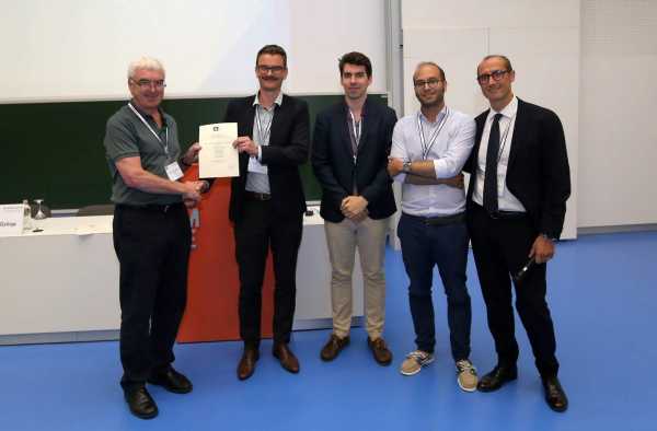 Torbjörn, Oliver and Omid being awarded